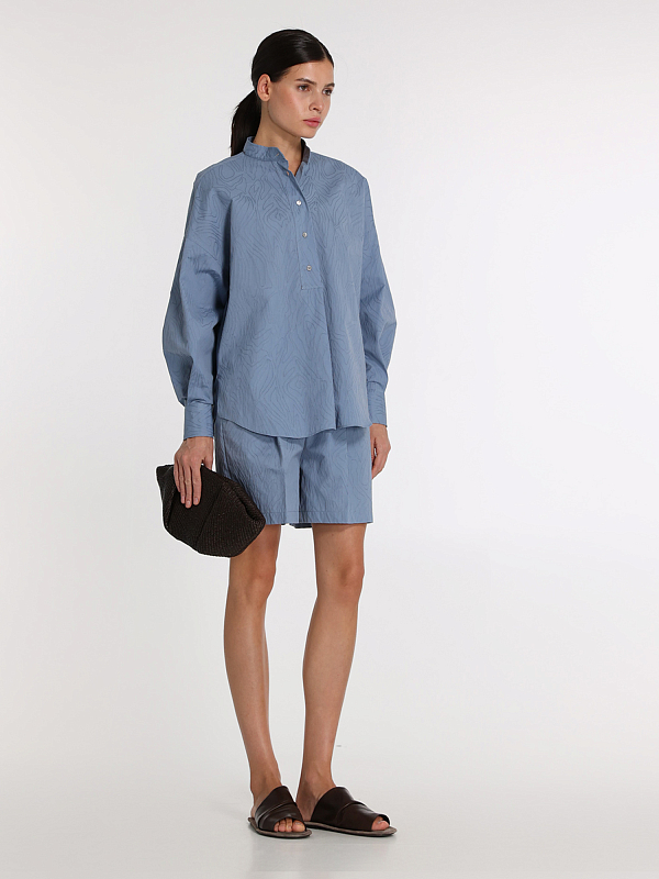 шорты Brunello Cucinelli MQ994HH299 цвет голубой